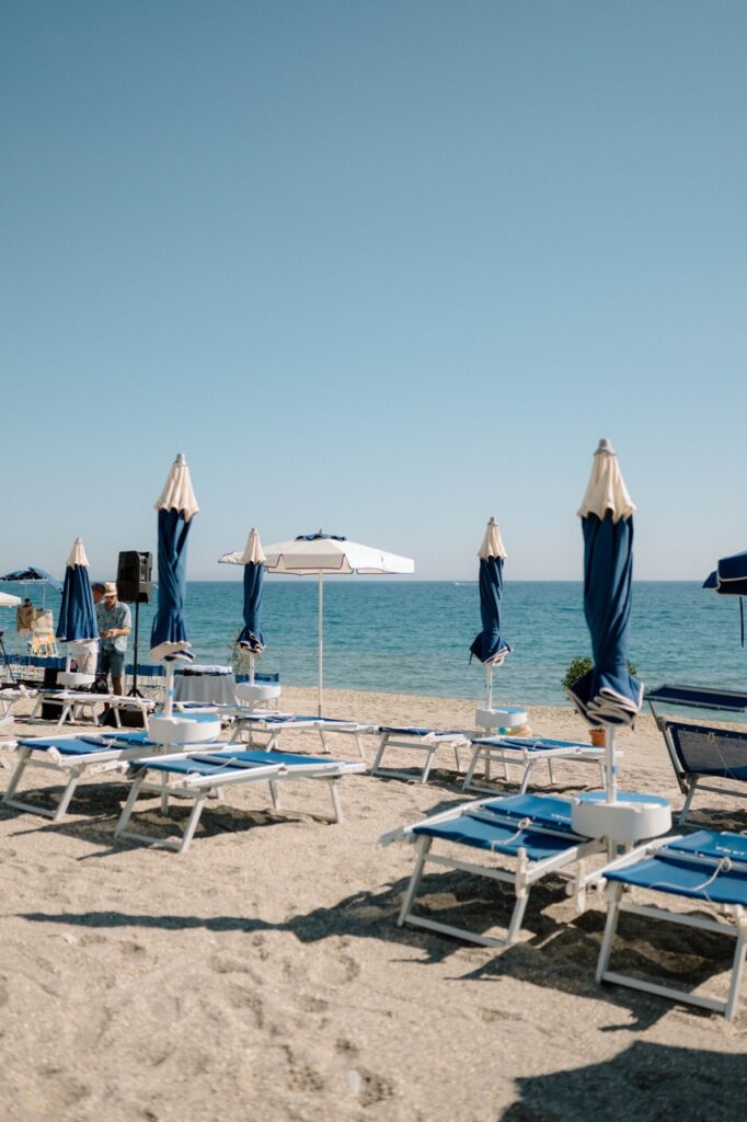 Private beach ceremony setup, destination wedding Finale Ligure Italy